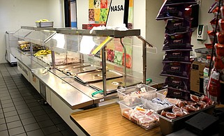 Staff file photo / A school nutrition official has been charged with selling off cafeteria equipment for his own gain without authorization.
